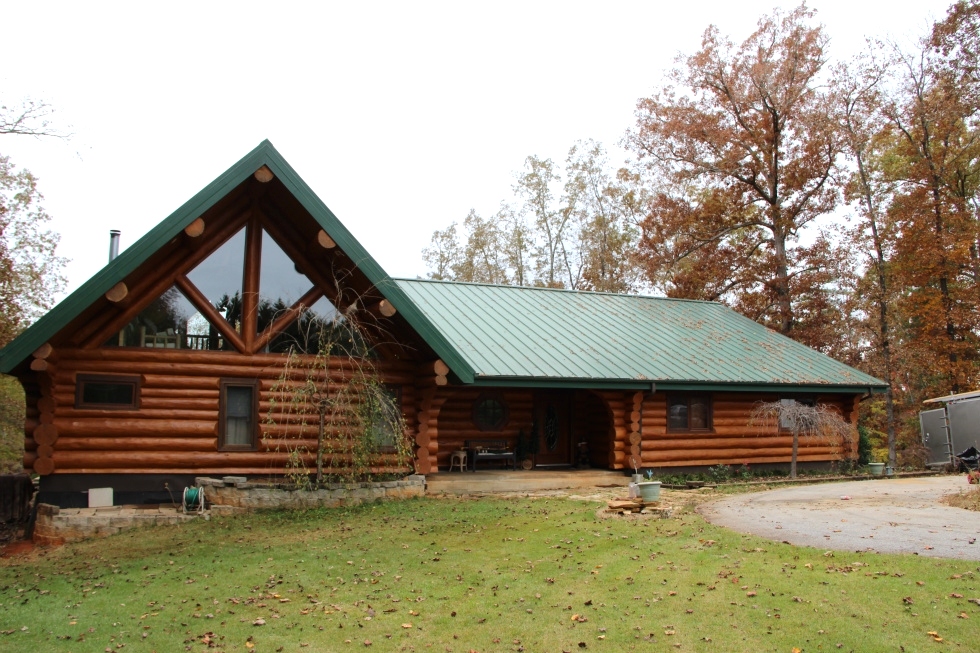 Log Home Sealing and Log home staining Log Home Repair 