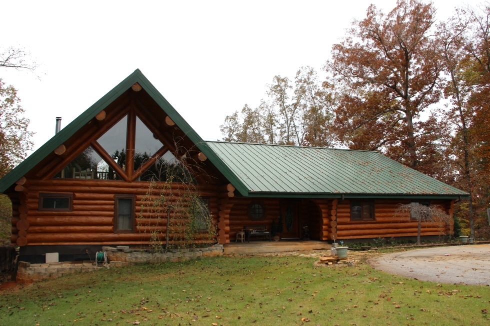 Log Home Sealing and Log home staining Log Home Repair 