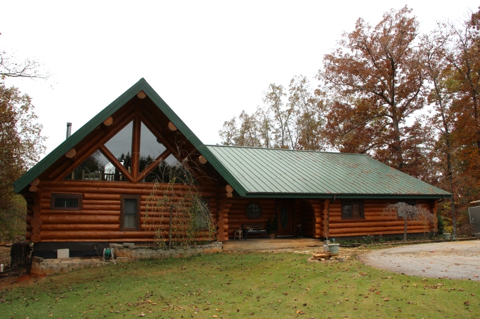 Log Home Sealing and Log home staining Log Home Repair 