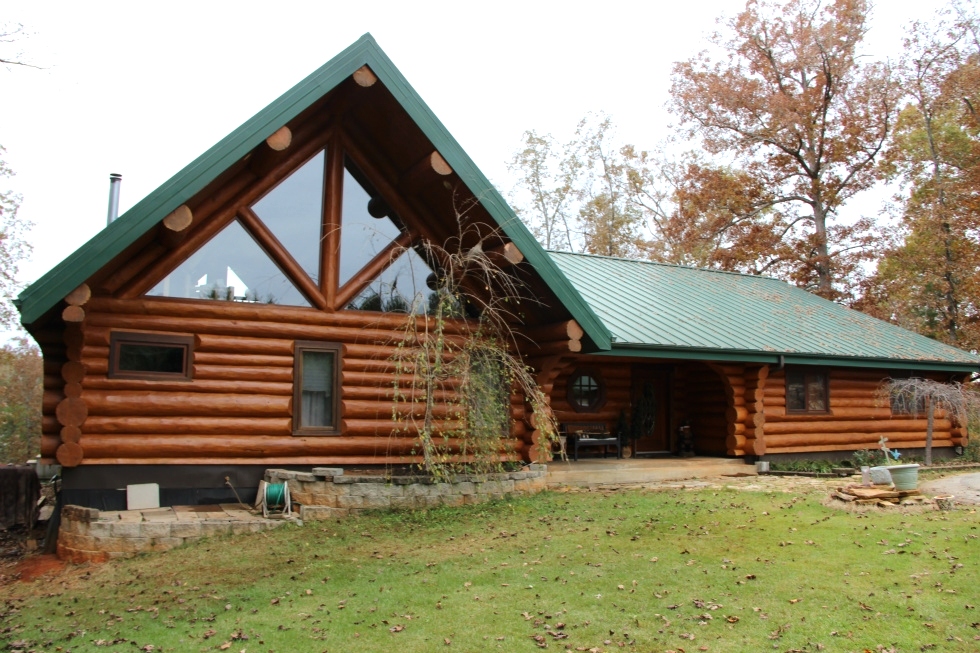 Log Home Sealing and Log home staining Log Home Repair 