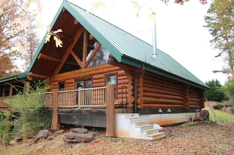 Log Home Sealing and Log home staining Log Home Repair 