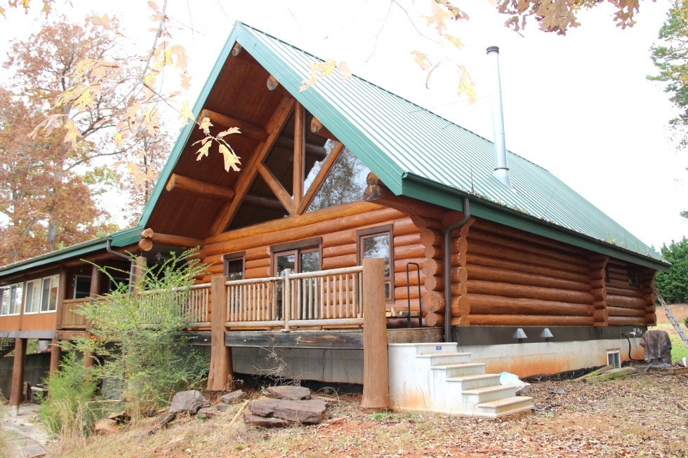 Log Home Sealing and Log home staining Log Home Repair 