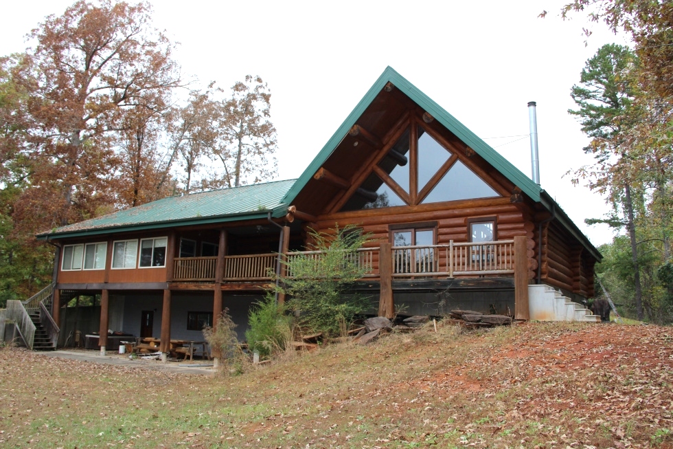 Log Home Sealing and Log home staining Log Home Repair 