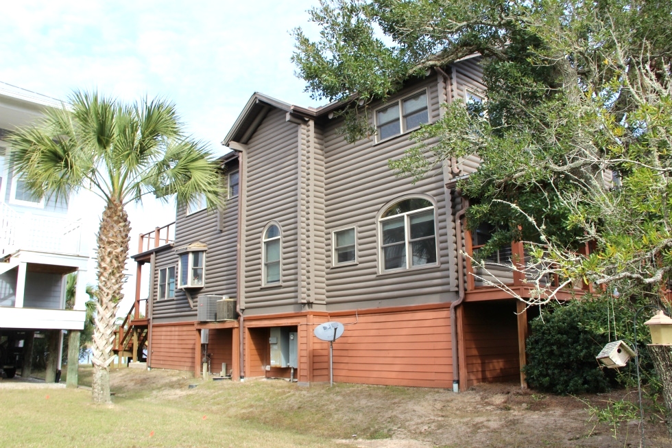 Log Home Staining | Log Home Seal, Caulk and Staining Log Home Repair 