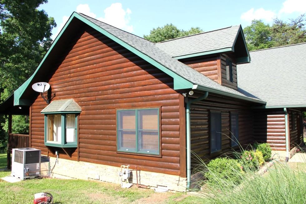 Log Cabin Restoration | Log Cabin Wash, Caulking And Staining  Log Home Repair 