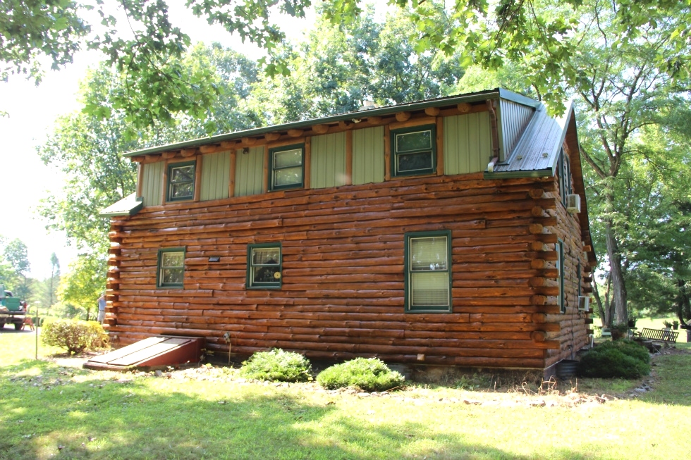 Log Cabin Staining by the LogDoctors Log Home Repair 