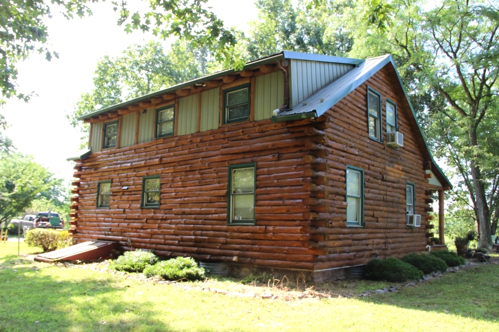 Log Cabin Staining by the LogDoctors Log Home Repair 