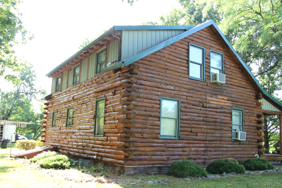 Log Cabin Staining by the LogDoctors Log Home Repair 